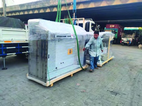 Wrapped equipment being prepared for transportation